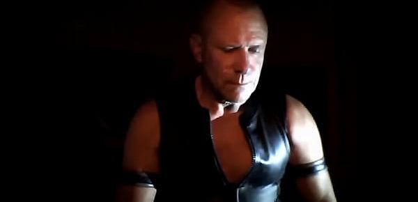  smoking large cigar in leather